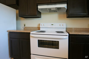 Merida Vista Apartments by Corrinthian Asset Management Interior Kitchen Room with Appliances Focus View