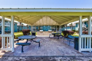 Palm Isle Apartment Homes Exterior Lobby and BBQ Area in Biloxi, MS Photo