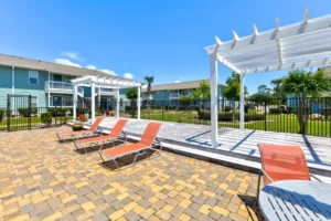 Palm Isle Apartment Homes Exterior with Pergola Relaxation View in Biloxi, MS