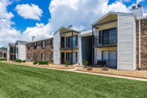 Exterior photo of Edgewater Pointe Apartments in Biloxi, MS, highlighting the complex's design