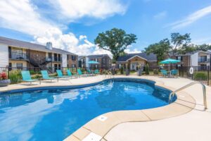 Exterior view of the pool at Edgewater Pointe Apartments, featuring a relaxing atmosphere in Biloxi, MS