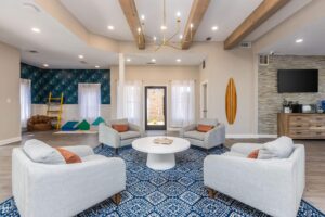 Interior of the living room at Edgewater Pointe Apartments, showcasing stylish furnishings in Biloxi, MS
