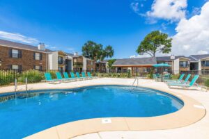Outdoor swimming pool at Edgewater Pointe Apartments, designed for leisure and relaxation in Biloxi, MS